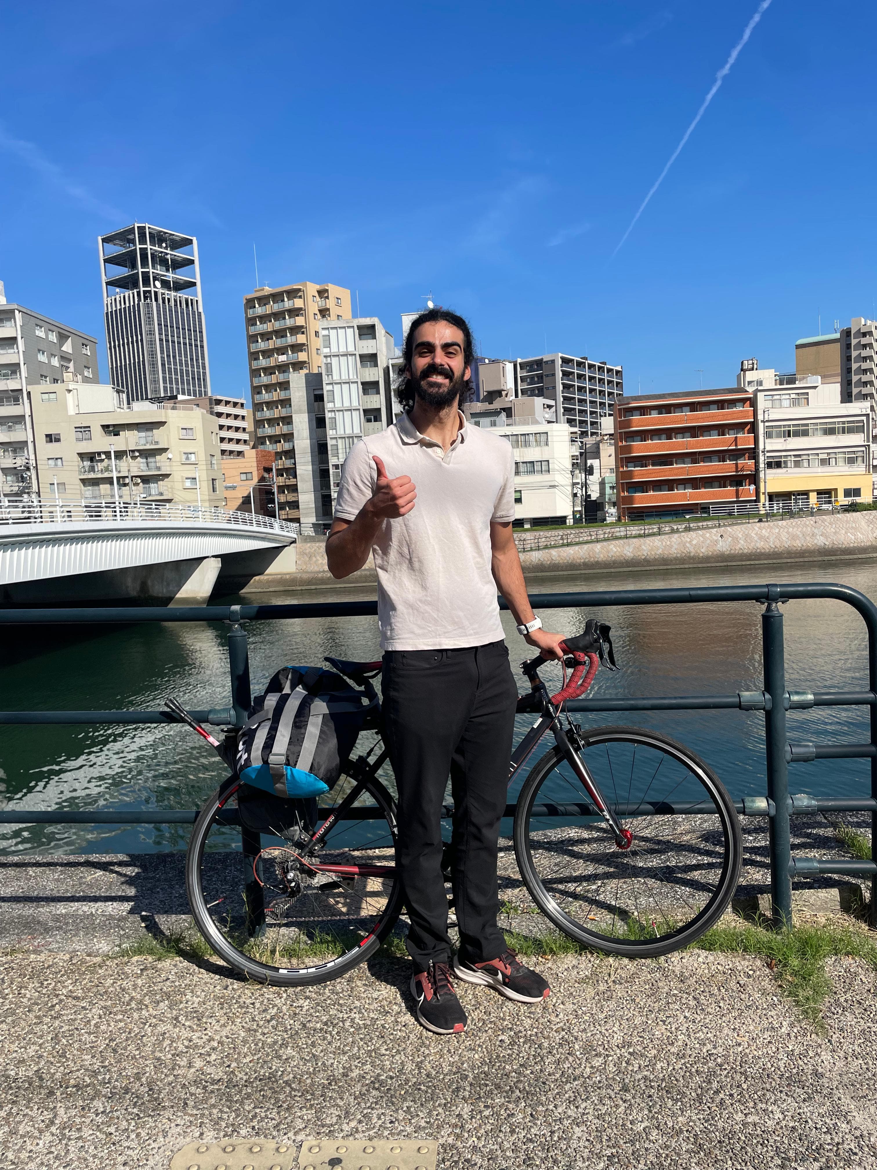 With touring bike, thumbs up