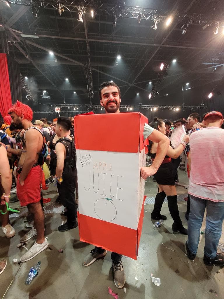 Wearing homemade apple juice box costume